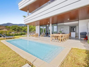 Apartamento con jardín y piscina privada en Higuerón West